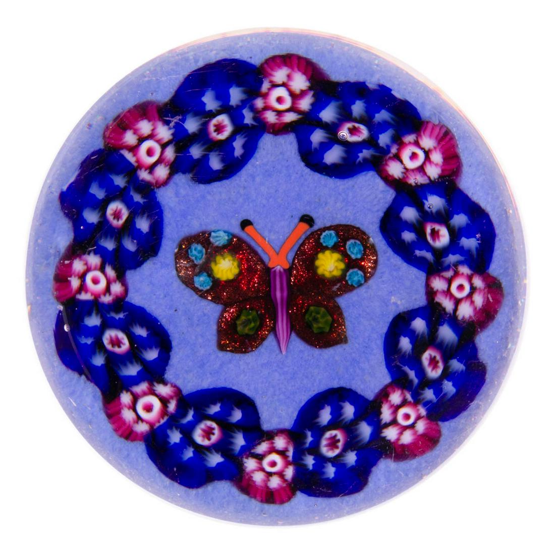 EARLY PAUL YSART (SCOTTISH, 1904-1979) ATTRIBUTED: EARLY PAUL YSART (SCOTTISH, 1904-1979) ATTRIBUTED BUTTERFLY LAMPWORK AND MILLEFIORI ART GLASS PAPERWEIGHT, encasement having a purple tint, central butterfly with a plum body and red aventurine wings