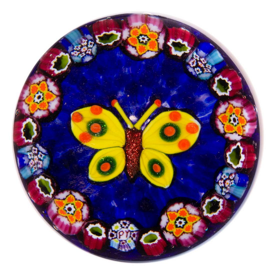 PAUL YSART (SCOTTISH, 1904-1979) BUTTERFLY LAMPWORK AND: PAUL YSART (SCOTTISH, 1904-1979) BUTTERFLY LAMPWORK AND MILLEFIORI ART GLASS PAPERWEIGHT, central butterfly with a red aventurine body and yellow wings with aventurine green and orange spots, encircle