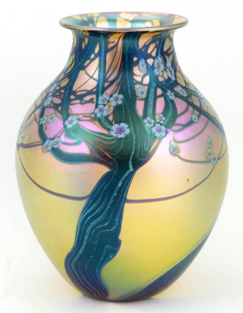 ORIENT & FLUME HAWTHORN MILLEFIORI AND IRIDESCENT: ORIENT & FLUME HAWTHORN MILLEFIORI AND IRIDESCENT STUDIO ART GLASS VASE, golden iridescent ground, variegated trees and branches with many white millefiori floral cane blossoms in the trees, signed to