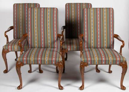 BAKER QUEEN ANNE-STYLE CARVED MAHOGANY SET OF FOUR EASY: BAKER QUEEN ANNE-STYLE CARVED MAHOGANY SET OF FOUR EASY / LOLLING CHAIRS, featuring shepherd's crook arms and cabriole legs with acanthus-carved knees and pad feet. Upholstery with brass tacks. Plaque