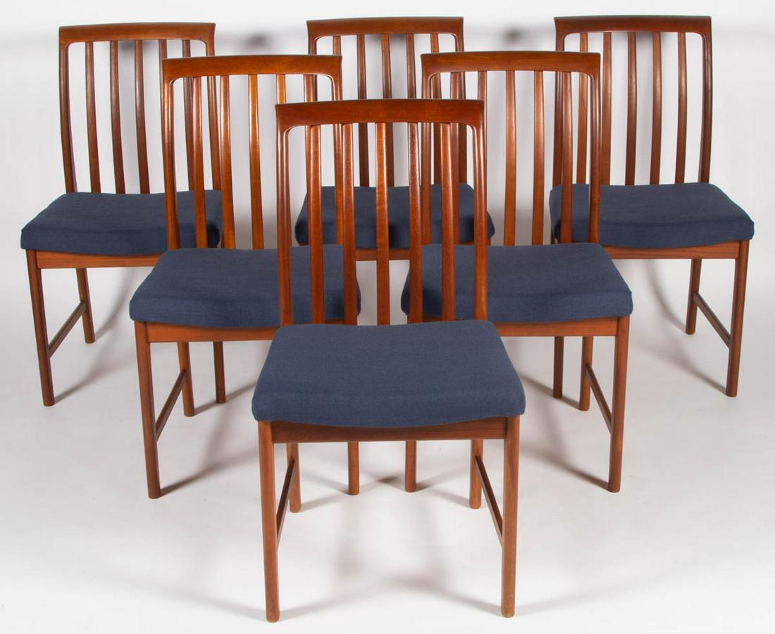 SET OF SIX DUX MID-CENTURY MODERN TEAKWOOD DINING: SET OF SIX DUX MID-CENTURY MODERN TEAKWOOD DINING CHAIRS, seats upholstered in blue fabric. Circa 1950. 35" H, 17" x 19" seat. Shipping Note: IN-HOUSE SHIPPING IS NOT AVAILABLE FOR THIS LOT. Please co