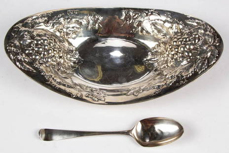 HESTER BATEMAN GEORGIAN ENGLISH STERLING SILVER: HESTER BATEMAN GEORGIAN ENGLISH STERLING SILVER TABLESPOON, having an oval bowl on a Hanoverian-type handle. Back of handle impressed with an "HB" maker's mark for Hester Bateman and three mostly worn