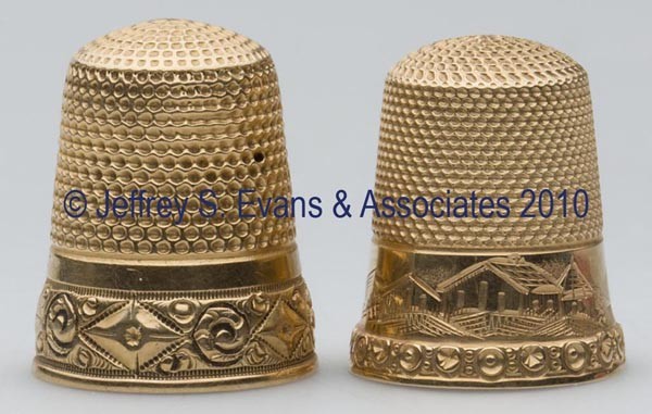 HENRY MUHR & SONS 14K GOLD THIMBLES, LOT OF TWO: HENRY MUHR & SONS 14K GOLD THIMBLES, LOT OF TWO, chased and engraved decorations, consisting of a scenic pattern and a diamond and scroll pattern. Each with maker's crown mark and "M" on band and a "1