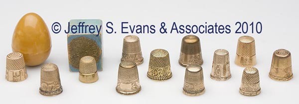 VARIOUS GOLD AND GOLD-FILLED THIMBLES, LOT OF 12: VARIOUS GOLD AND GOLD-FILLED THIMBLES, LOT OF 12, various chased and engraved floral, berry and plain band patterns, consisting of a tested 9K panel band hallmarked with three stars on band and patent
