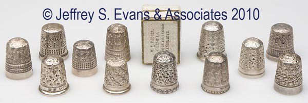 CHARLES HORNER STERLING SILVER EMBROIDERY THIMBLES,: CHARLES HORNER STERLING SILVER EMBROIDERY THIMBLES, LOT OF 11, various patterns, consisting of nine Daisy patterns with various band patterns including one with "Rd No. 210800" and in a box stamped "W
