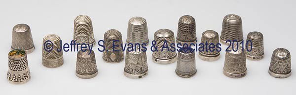 HENRY GRIFFITH STERLING SILVER THIMBLES, LOT OF 16: HENRY GRIFFITH STERLING SILVER THIMBLES, LOT OF 16, consisting of seven embroidery examples, including one with floral pattern and others with palmettes; four with floral and daisy patterned bands; tw