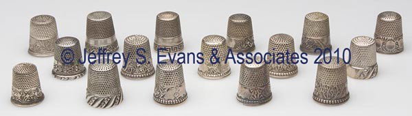 KETCHAM & MCDOUGALL STERLING SILVER THIMBLES, LOT O: KETCHAM & MCDOUGALL STERLING SILVER THIMBLES, LOT OF 16, consisting of 11 chased bright-cut with palmette pattern; two Chased Rope Band; a double-band Greek Key; a building and landscape pattern; and 