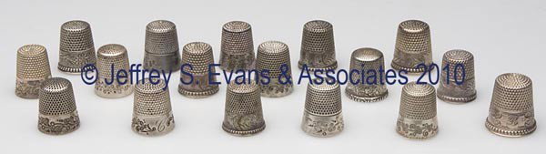 KETCHAM & MCDOUGALL STERLING SILVER THIMBLES, LOT O: KETCHAM & MCDOUGALL STERLING SILVER THIMBLES, LOT OF 17, various floral bands, consisting of nine with abstract flowers; four Lily-of-the-Valley; three Damask Flower; and a Damask Lily. Each with make