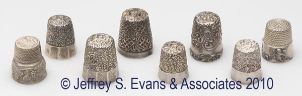 SIMONS BROTHERS STERLING SILVER THIMBLES, LOT OF EI: SIMONS BROTHERS STERLING SILVER THIMBLES, LOT OF EIGHT, consisting of six embroidery examples including four Vermicelli Top and Facet with paneled bands, one Louis XV Rim, and one Scroll Chased Top; a