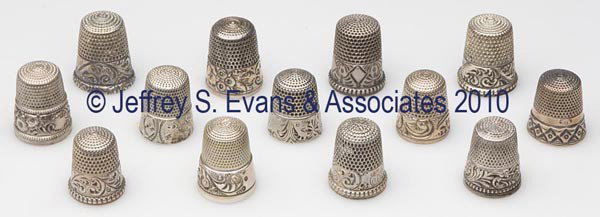 SIMONS BROTHERS STERLING SILVER THIMBLES, LOT OF 13: SIMONS BROTHERS STERLING SILVER THIMBLES, LOT OF 13, various chased and engraved scroll and geometric patterns. Each with maker's mark in apex, four not marked sterling, one example impressed "41AD" i