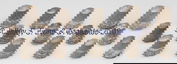 SIMONS BROTHERS STERLING SILVER DOUBLE-BAND THIMBLE: SIMONS BROTHERS STERLING SILVER DOUBLE-BAND THIMBLES, LOT OF 15, various chased, engraved and rolled floral patterns and a bird pattern. Each with maker's mark in apex, five not marked sterling, three