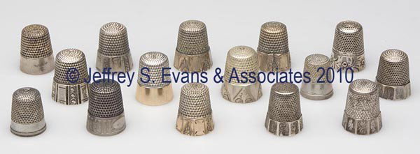 WAITE, THRESHER CO. STERLING SILVER THIMBLES, LOT : WAITE, THRESHER CO. STERLING SILVER THIMBLES, LOT OF 15, five examples with gold bands, consisting of eight paneled band with various scrolls; a paneled plain band; four plain band; a chased floral ba