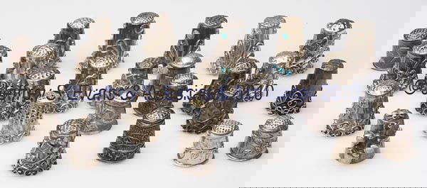 CONTEMPORARY SOUTH AMERICAN STERLING SILVER AND ME: CONTEMPORARY SOUTH AMERICAN STERLING SILVER AND METAL THIMBLES, LOT OF 25, consisting of 17 with applied wirework decoration, including two examples with turquoise stones and one with two moonstone co