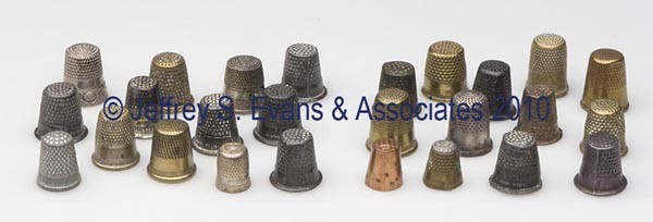 CHILDREN'S VARIOUS METALS THIMBLES, LOT OF 26: CHILDREN'S VARIOUS METALS THIMBLES, LOT OF 26, including two sterling silver examples, ten "For A Good Girl", one example possibly Gabler. Late 19th to 20th century. Various sizes. Provenance: Collect