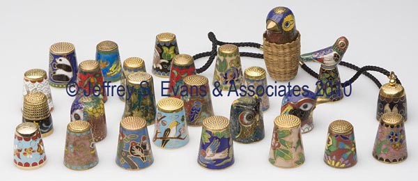 CONTEMPORARY CLOISONNÉ' THIMBLES, LOT OF 26: CONTEMPORARY CLOISONNÉ' THIMBLES, LOT OF 26, including four figural animal examples, one with a basket holder. 20th century.15/16" to 1 1/4" h. Provenance: Collection of the late Fern I. Hill.