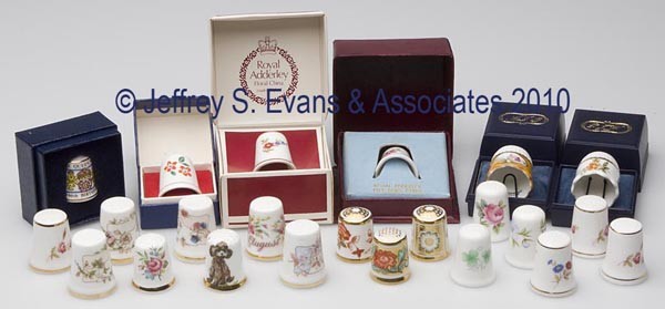 ENGLISH CERAMIC THIMBLES, LOT OF 23: ENGLISH CERAMIC THIMBLES, LOT OF 23, various hand-painted and transfers in floral patterns and a dog, consisting of six Royal Adderley Floral Bone China; four Royal Doulton with seasons by Jill Barkle