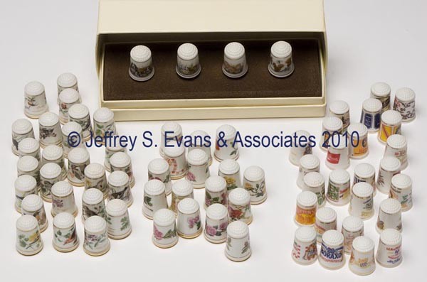 FRANKLIN PORCELAIN CO. BONE CHINA THIMBLES, LOT OF: FRANKLIN PORCELAIN CO. BONE CHINA THIMBLES, LOT OF 70, consisting of 25 with country store advertisements and original paperwork; 25 with various birds; 12 for "The Royal National Rose Society"; four 