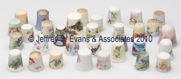 HANDPAINTED CERAMIC AND PORCELAIN THIMBLES, LOT OF: HANDPAINTED CERAMIC AND PORCELAIN THIMBLES, LOT OF 32, polychrome floral, bird and scenic decorations, each with artist initials or signature, several dated. 20th century. 13/16" to 1 3/16" h. Provena