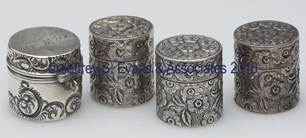 VARIOUS STERLING SILVER THIMBLE CASES, LOT OF FOUR: VARIOUS STERLING SILVER THIMBLE CASES, LOT OF FOUR, consisting of three matching examples with floral Forget-Me-Not pattern, and a La Pierre Mfg. Co. example with scroll pattern and monogram to top, e