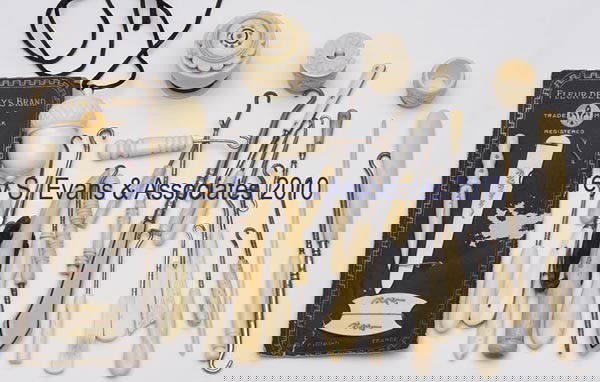 BONE / IVORY SEWING ARTICLES, LOT OF 33: BONE / IVORY SEWING ARTICLES, LOT OF 33, consisting of 22 various glove hooks including one enclosed hook example; two thimble cases including an acorn-form with thimble; two carved spool barrels; two