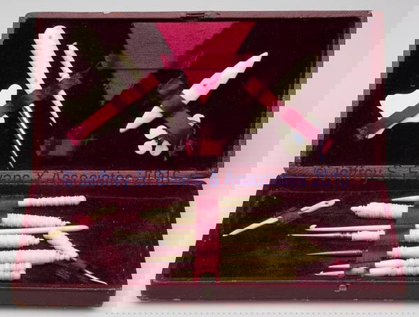 BONE / IVORY SEWING KIT: BONE / IVORY SEWING KIT, red leather case with hinged lid, underside with gilt stamping "J. G. VICKERY 179, 181, 183 REGENT ST W.", red velvet and satin interior. Needleworking tools include five vari