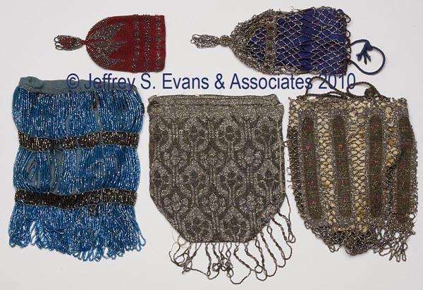 FIVE ASSORTED LADY'S BEADED PURSES: FIVE ASSORTED LADY'S BEADED PURSES, draw-string style, including cut-steel, metallic, and glass beads, three with lining. First half 20th century. 2 1/2" x 3 1/2" to 9" x 4". Provenance: Hilda Fried e