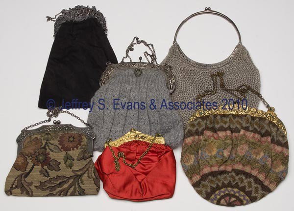 SIX ASSORTED LADY'S PURSES: SIX ASSORTED LADY'S PURSES, each with a fabric bag and metal frame, three hallmarked for 800 silver, chains appear original. First half 20th century. Largest 8" x 8". Provenance: Hilda Fried estate, N