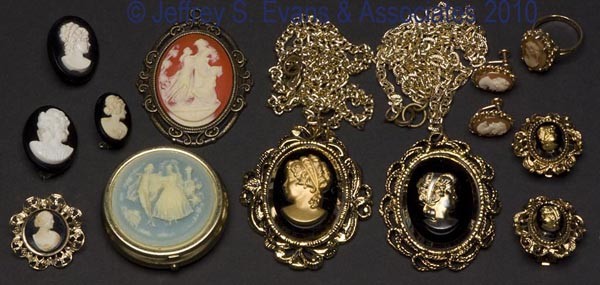 ASSORTED LOT OF CAMEO-STYLE COSTUME JEWELRY: ASSORTED LOT OF CAMEO-STYLE COSTUME JEWELRY, 13 pieces, including pendants, brooches, earrings, a ring, and a pill box. 20th century. Various sizes.