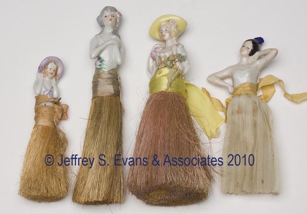 FOUR ASSORTED CHINA HALF DOLLS: FOUR ASSORTED CHINA HALF DOLLS, three fitted with whisk brooms, marked Germany and Japan. First half 20th century. 5 1/2" to 8" h overall. Provenance: Hilda Fried estate, New York City.