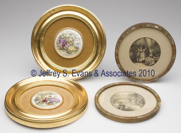 TWO PAIRS OF ROMANTIC PICTURES / PLAQUES: TWO PAIRS OF ROMANTIC PICTURES / PLAQUES, one pair with hand-tinted prints and one pair with transfer-decorated porcelain inserts, original frames. 20th century. 6 1/2" and 8" dia overall.