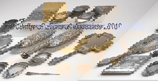 FIFTEEN ASSORTED METALS DRESSER ARTICLES: FIFTEEN ASSORTED METALS DRESSER ARTICLES, comprised of boxes, hand mirrors, and hair brushes, including quadruple-plate, silver-washed, tin, and gold-painted examples. 19th and 20th centuries. Various