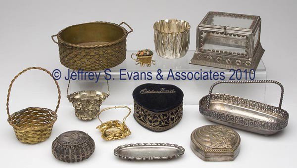 TWELVE ASSORTED METALS DRESSER ARTICLES: TWELVE ASSORTED METALS DRESSER ARTICLES, including silver-plate, brass, and tin examples. 19th and 20th centuries. Various sizes. Provenance: Hilda Fried estate, New York City.