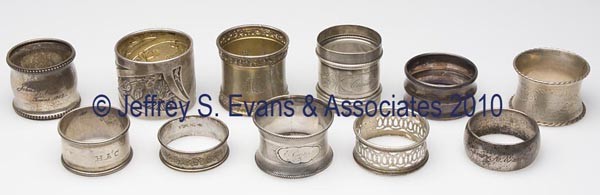 ELEVEN ASSORTED SILVER NAPKIN RINGS: ELEVEN ASSORTED SILVER NAPKIN RINGS, comprised of seven marked sterling examples, one marked 800 example, and three unmarked examples of unknown silver content, sterling silver examples include two Go