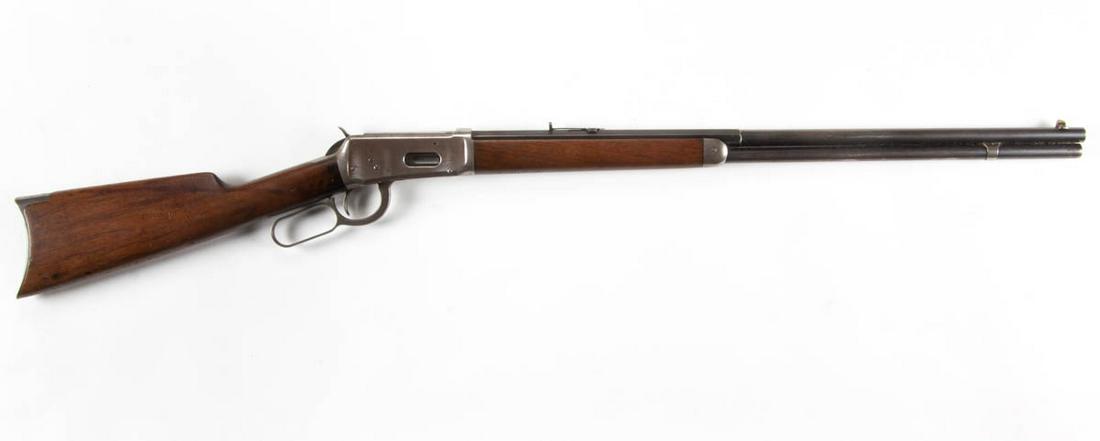 WINCHESTER MODEL 1894 LEVER-ACTION RIFLE: WINCHESTER MODEL 1894 LEVER-ACTION RIFLE, .30 WCF caliber, serial number 518353, walnut stock branded "LD", grip tang marked "MODEL 1894 / WINCHESTER / TRADE MARK REG. IN U.S. PAT. OFF.", octagonal ba