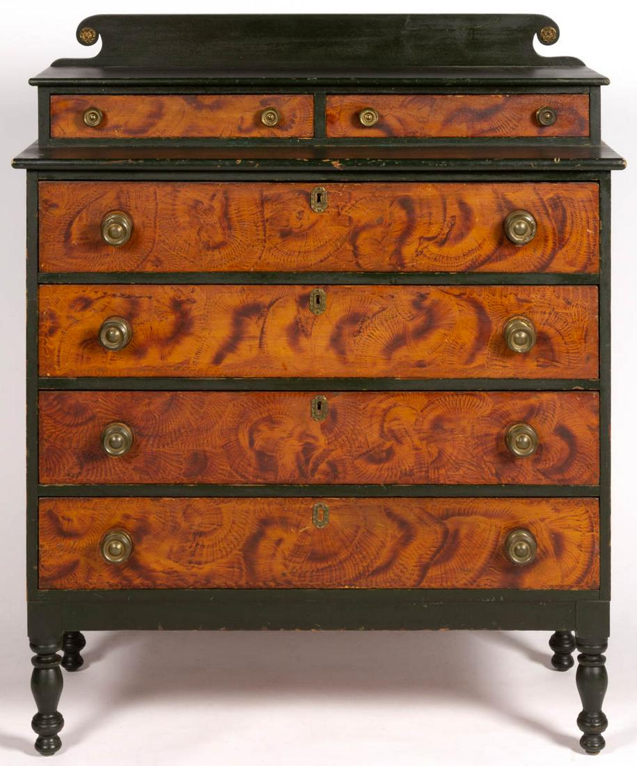NEW ENGLAND PAINT-DECORATED PINE CHEST OF DRAWERS: NEW ENGLAND PAINT-DECORATED PINE CHEST OF DRAWERS, a very fine example featuring shaped backsplash above two set-back short drawers and four full drawers, all fitted with period stamped-brass knobs in