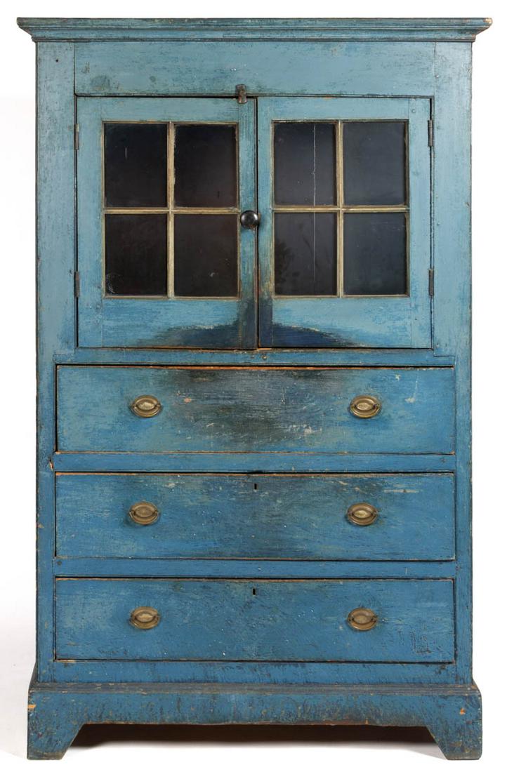 AMERICAN PAINTED PINE FLATWALL CUPBOARD: AMERICAN PAINTED PINE FLATWALL CUPBOARD, one-piece construction, the applied molded cornice over two four-light doors above three full drawers fitted with period oval stamped-brass pulls, solid ends, 