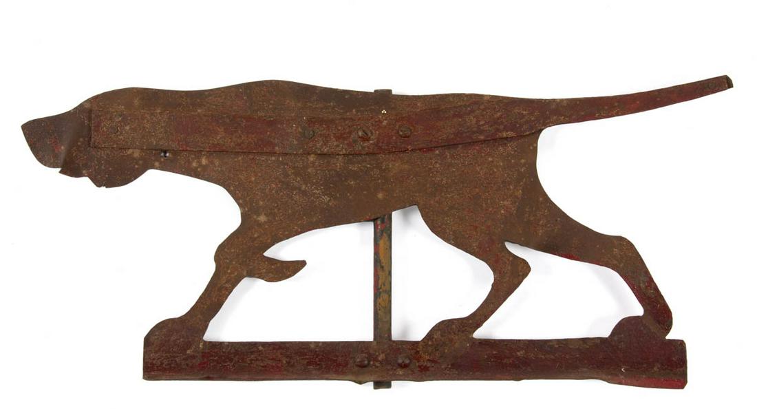 AMERICAN FOLK ART CUT-OUT SHEET-IRON POINTER / BIRD DOG: AMERICAN FOLK ART CUT-OUT SHEET-IRON POINTER / BIRD DOG WEATHERVANE, in full pointing position, riveted iron support bar to one side, attached to a hollow mounting rod. Old weathered surface with remn