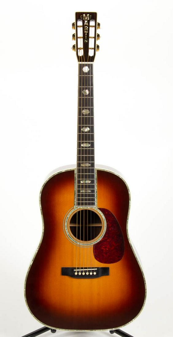 1988 MARTIN D-45 S SUNBURST ACOUSTIC GUITAR: 1988 MARTIN D-45 S SUNBURST ACOUSTIC GUITAR, serial number 479601, six string, spruce top with medium bronze sunburst finish, faux tortoise shell pickguard, and abalone inlay to rosette and along edge