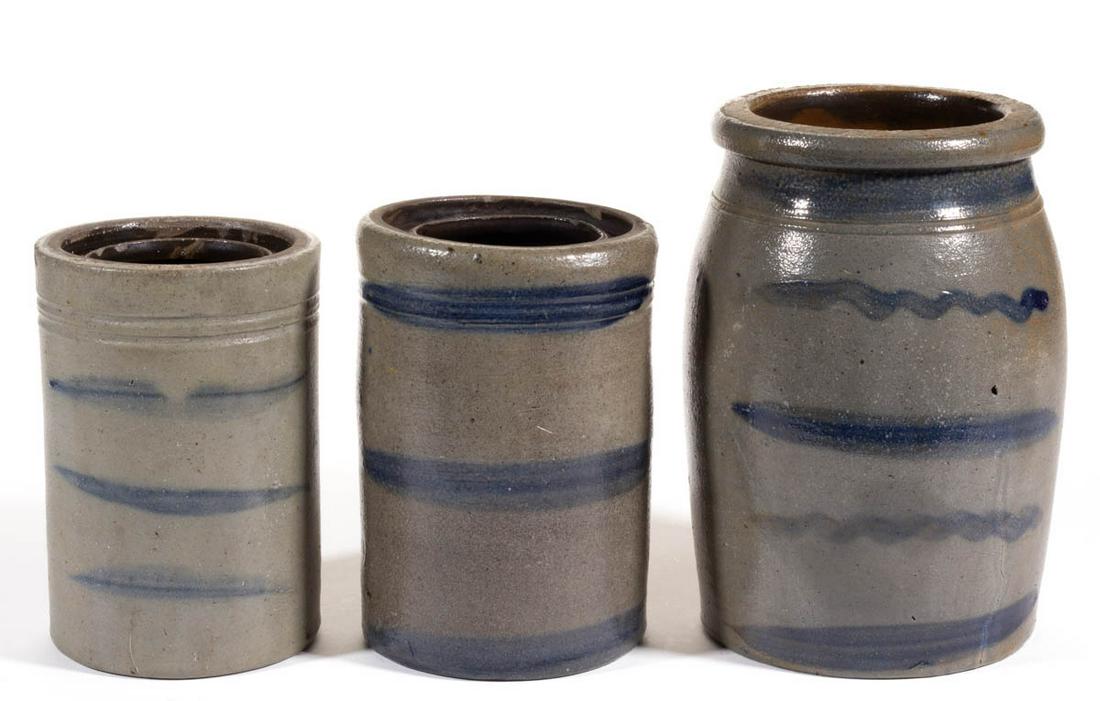 WESTERN PENNSYLVANIA DECORATED STONEWARE ARTICLES, LOT: WESTERN PENNSYLVANIA DECORATED STONEWARE ARTICLES, LOT OF THREE, salt-glazed, comprising a half-gallon jar and two quart canners with grooved wax-seal rims, each with Albany-slip glazed interior. Each