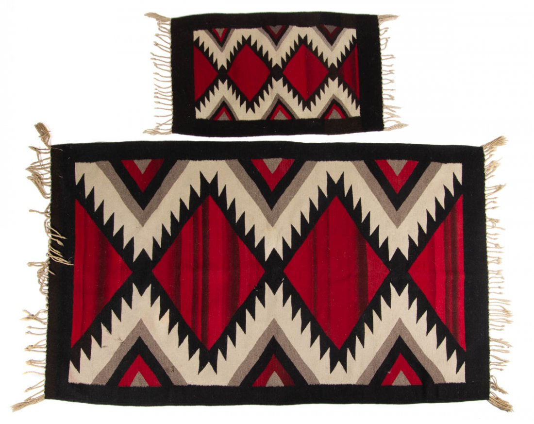 NATIVE AMERICAN-STYLE WOOL RUGS, SET OF TWO: NATIVE AMERICAN-STYLE WOOL RUGS, SET OF TWO, comprising a large and a small example, each with colors consisting of red, black, white, and grey, featuring serrated diamonds, fringe to ends. Possibly M