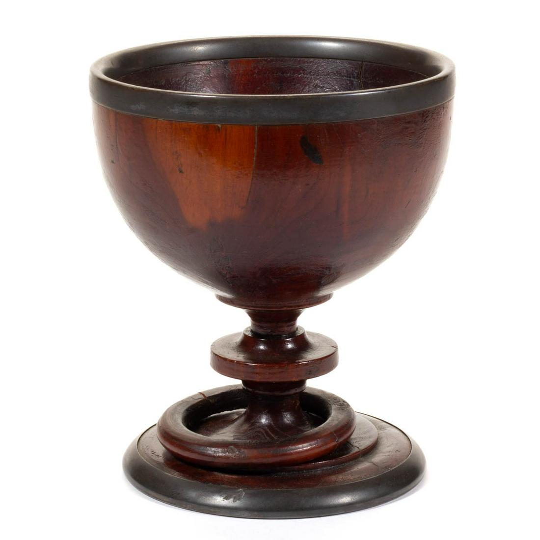CHRIST CHURCH, ALEXANDRIA, VIRGINIA HISTORICAL ARTIFACT: CHRIST CHURCH, ALEXANDRIA, VIRGINIA HISTORICAL ARTIFACT, being a turned wood chalice with applied pewter rim and foot edge having a loose ring around the stem. Underside with a typed note indicating t