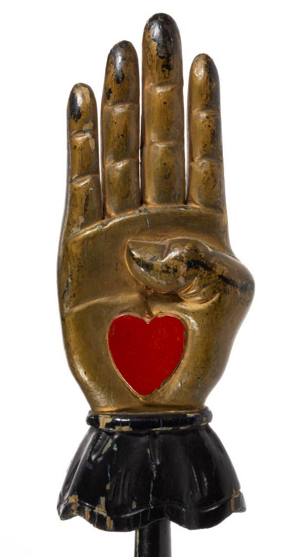 AMERICAN FOLK ART CARVED AND PAINTED HEART-IN-HAND: AMERICAN FOLK ART CARVED AND PAINTED HEART-IN-HAND CEREMONIAL STAFF, gilded hand with red heart and black-painted pole. Retains original painted surface. Said to be from the Odd Fellows Lodge No. 193,