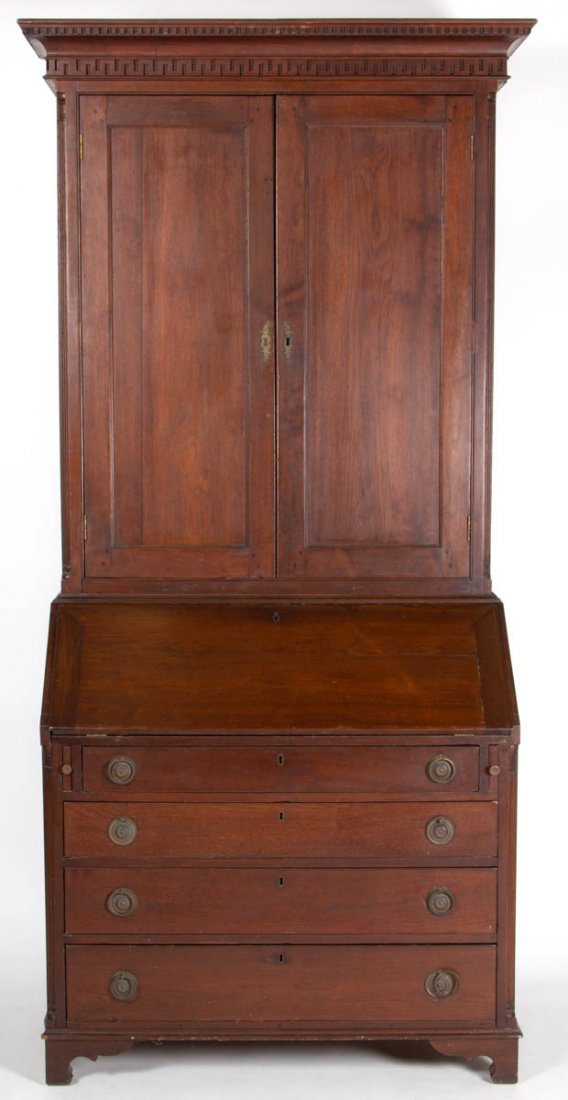 PIEDMONT NORTH CAROLINA CHIPPENDALE WALNUT DESK AND: PIEDMONT NORTH CAROLINA CHIPPENDALE WALNUT DESK AND BOOKCASE, three-piece construction, the bold, removable, cove-molded cornice featuring rows of dentil and Greek key decoration, the bookcase top hav