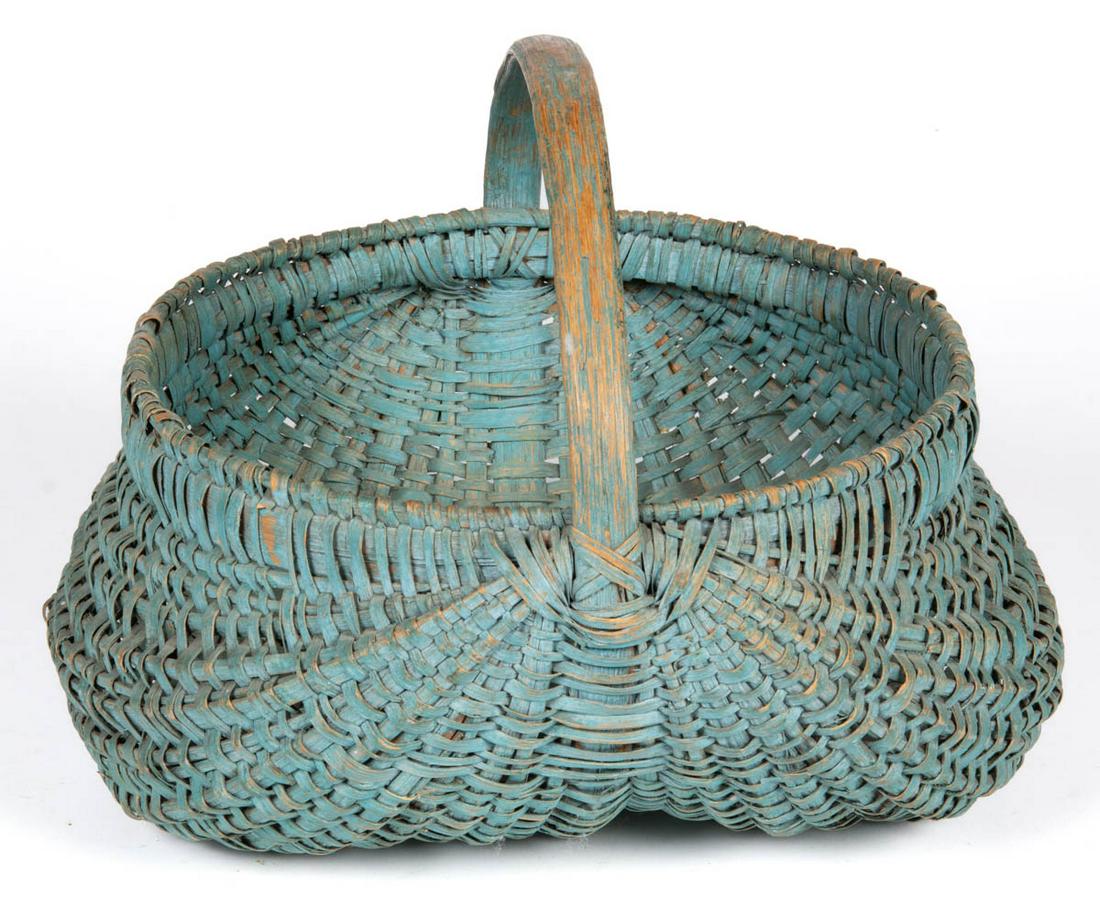 VALLEY OF VIRGINIA PAINTED RIB-TYPE WOVEN-SPLINT BASKET: VALLEY OF VIRGINIA PAINTED RIB-TYPE WOVEN-SPLINT BASKET, white oak, converging-rib form with wrapped rim and arched handle. Retains likely original dry blue-painted surface with consistent wear. Late 