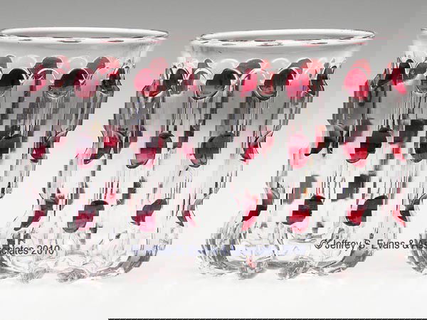 BROKEN COLUMN - RUBY STAINED PAIR OF TUMBLERS: BROKEN COLUMN - RUBY STAINED PAIR OF TUMBLERS, colorless. 3 3/4" h, 2 3/4" dia.Provenance: Collection of Stephen H. Chapman.