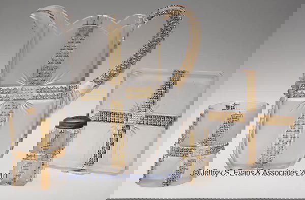 KLONDIKE - AMBER STAINED TABLE ARTICLES, LOT OF FO: KLONDIKE - AMBER STAINED TABLE ARTICLES, LOT OF FOUR, colorless with frosted finish, consisting of a condiment tray, tall shaker, tumbler and water pitcher. Dalzell, Gilmore & Leighton Co. Pitcher 8 3