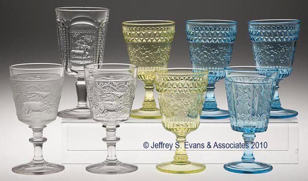 VARIOUS REPRODUCTION EAPG GOBLETS, LOT OF EIGHT: VARIOUS REPRODUCTION EAPG GOBLETS, LOT OF EIGHT, various colors, including Deer and Pine Tree and two Westward Ho, together with six others. 5 7/8" to 6 3/4" h. Prov. CatNotes.: Provenance: From the C