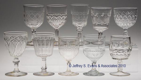 VARIOUS EAPG GOBLETS, LOT OF TEN: VARIOUS EAPG GOBLETS, LOT OF TEN, colorless, including Lighting, Philadelphia Centennial, Pittsburgh Centennial, and seven others. 5 7/8" to 6 1/8" h. Prov. CatNotes.: Provenance: From the estate of O