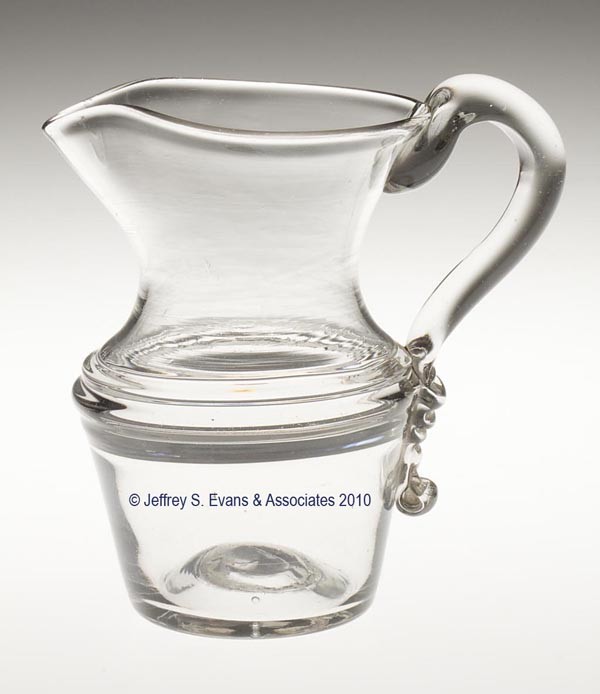 THOMAS CAINS DECORATED FREE-BLOWN HALF-PINT+ PITCHE: THOMAS CAINS DECORATED FREE-BLOWN HALF-PINT+ PITCHER, colorless with a decided gray cast, conical-form body with a triple-thread ring on shoulder, sheared rim, and an applied solid handle with a tripl