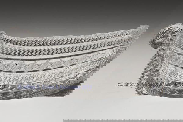 BT-9 BOAT PRESSED SALT: BT-9 BOAT PRESSED SALT, colorless, plain rim and base. Scarce. Boston & Sandwich Glass Co. 1830-1845. 1 5/8" H, 2" x 4". Literature: Neal, p. 34.